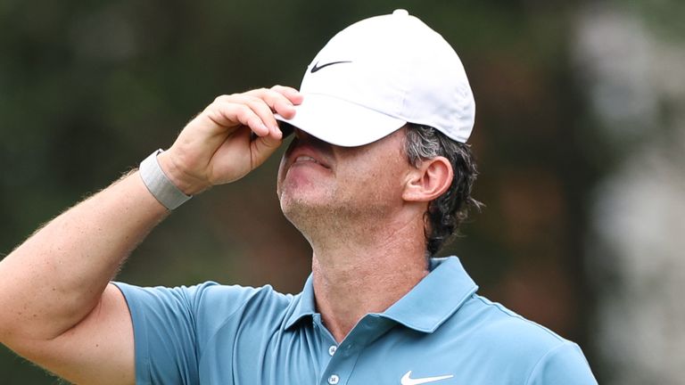 Rory McIlroy reacts on the second hole during the first round of the Tour Championship 