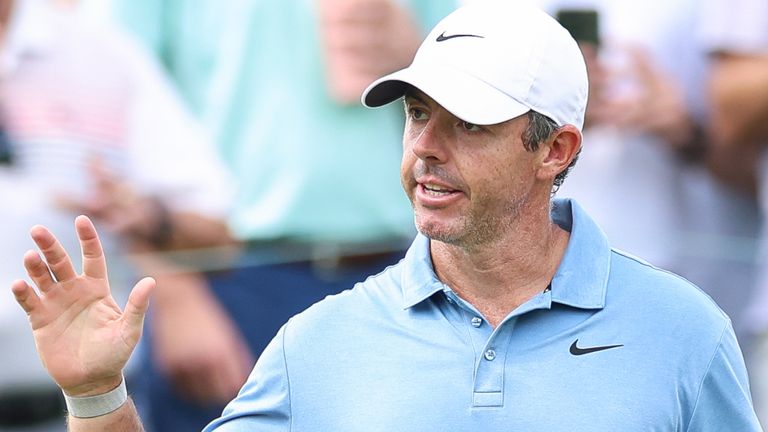 Rory McIlroy reacts after making a putt on the first hole during the second round of the Tour Championship 