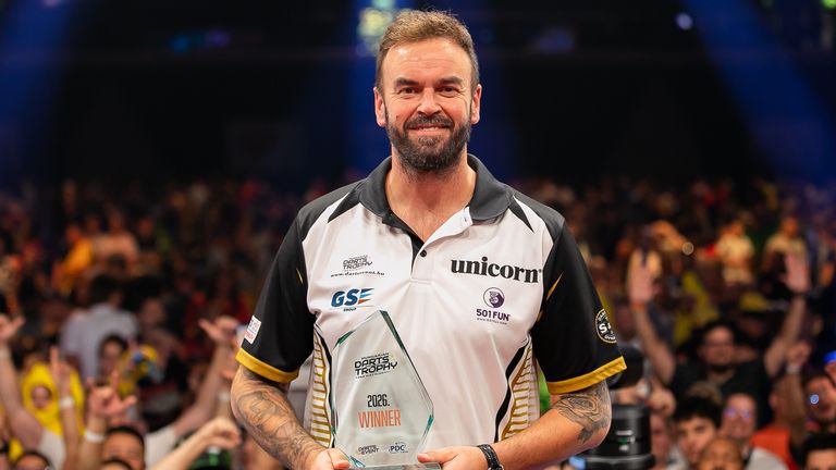 Smith was all smiles as he lifted the trophy in Budapest (Gabor Kiss/PDC Europe)