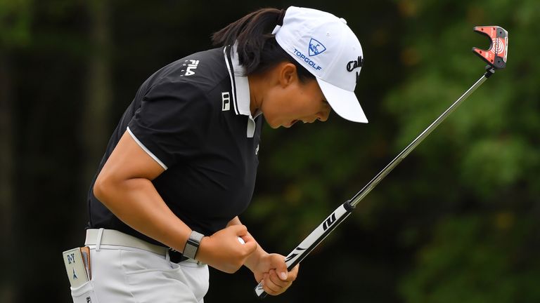 Ruoning Yin celebrates after sinking her final putt on the 18th green to win the FM Championship 
