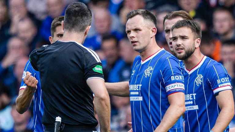 Rangers players appeal to referee Don Robertson 