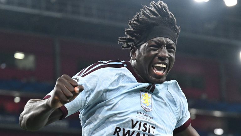 Brian Madjo of Aston Villa celebrates scoring against PSG