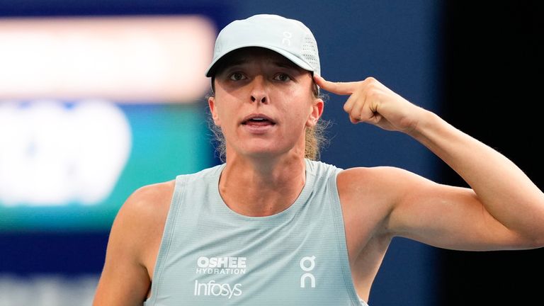Poland's Iga Swiatek gestures as she celebrates her 6-2, 6-3 win over Kazakhstan's Elena Rybakina in a National Bank Open final tennis match, in Toronto, Thursday, Aug. 13, 2026. (Chris Young/The Canadian Press via AP)