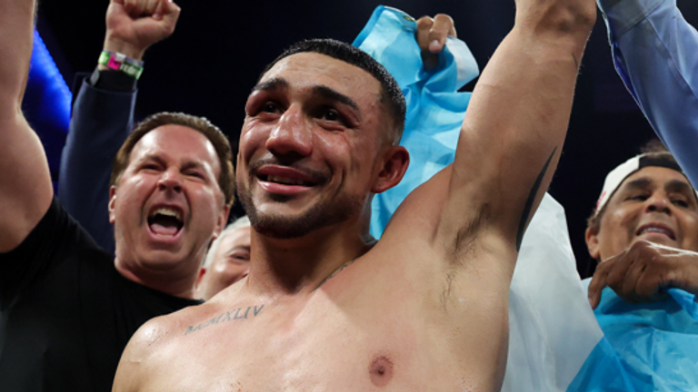 Teofimo Lopez celebrates his win over Rolly Romero to claim the WBA welterwight title