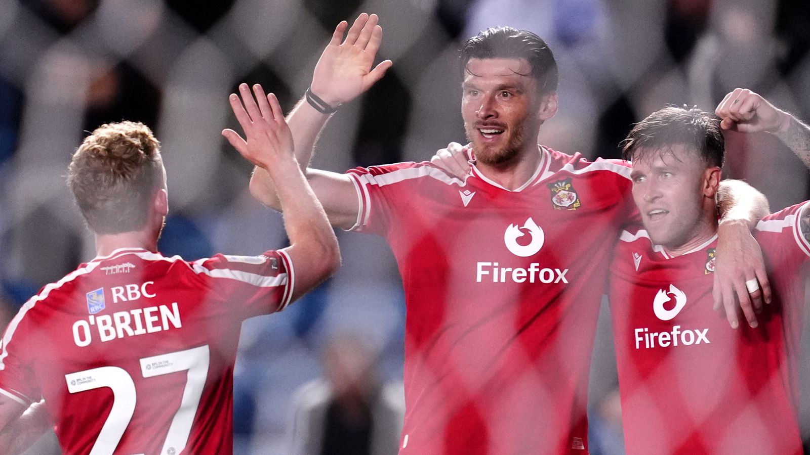 Wrexham Secures First Championship Win with 3-0 Victory Over Millwall