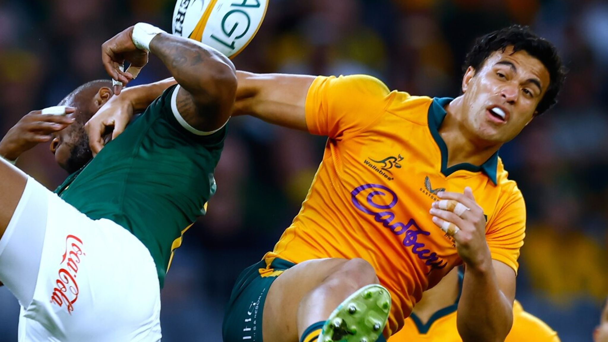 South Africa's Aphelele Fassi, left, and Australia's Joseph-Aukuso Suaalii compete for a high ball (AP Photo/Gary Day)