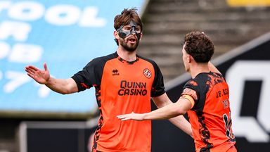 Dundee United's Michael Forbes (L) celebrates scoring the equaliser late on