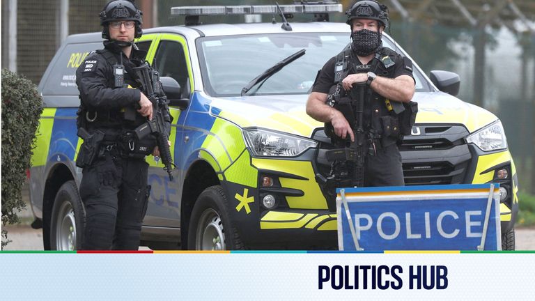 Police officers guard an area as roadblocks remain in place near RAF Fairford airbase. Pic: Reuters