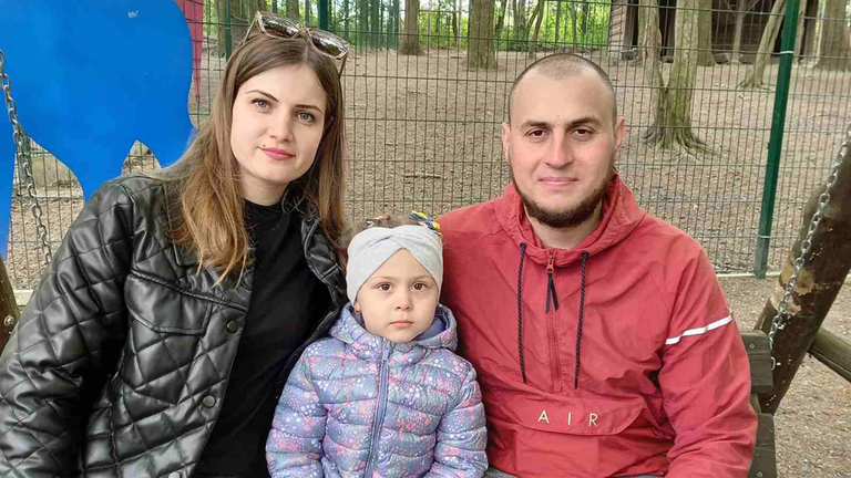 Iryna, her husband and daughter