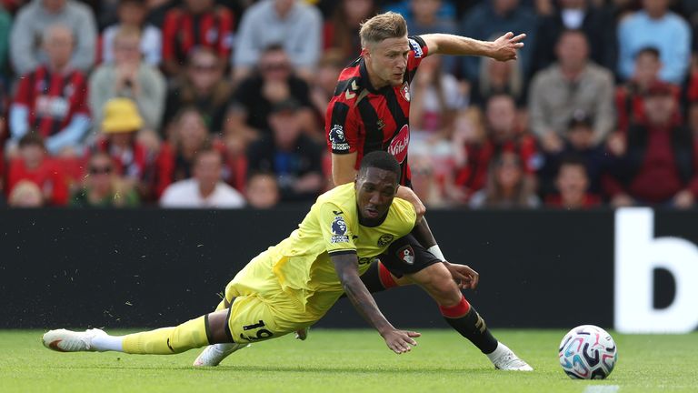 Adrien Truffert of Bournemouth challenges Brentford's Jaidon Anthony