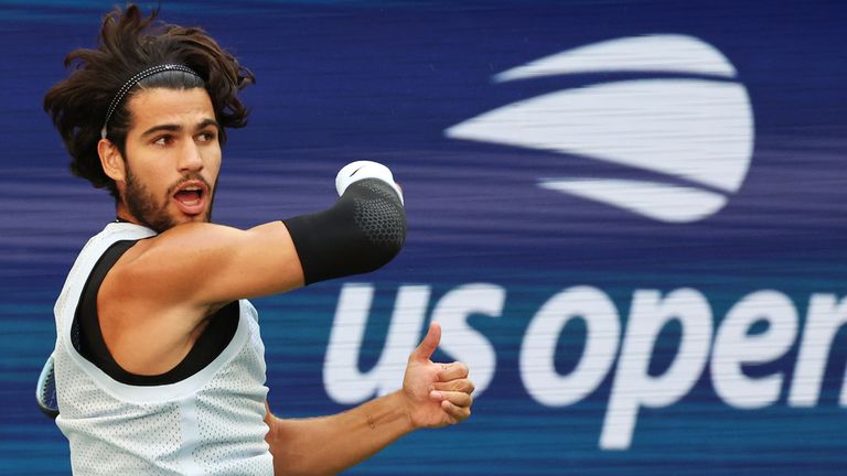 Carlos Alcaraz, of Spain, follows through on a shot to Tommy Paul, of the United States, during the fourth round of the U.S. Open tennis championships Sunday, Sept. 6, 2026, in New York. (AP Photo/Heather Khalifa)