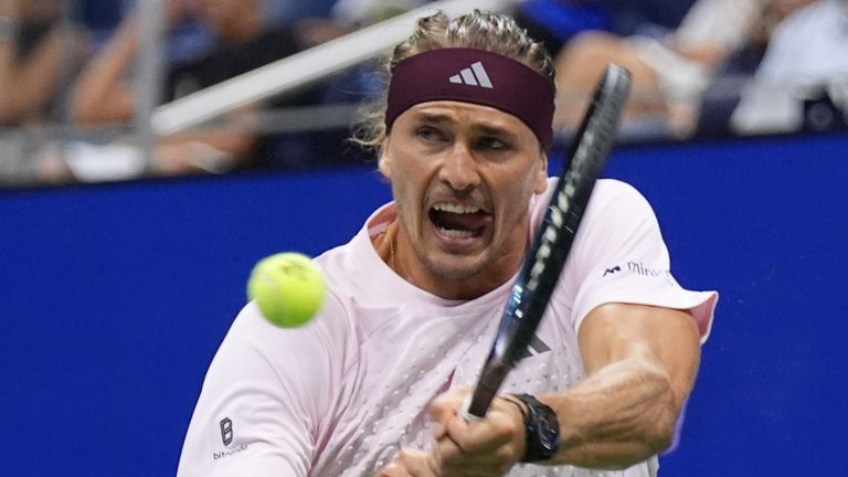 Alexander Zverev, of Germany, hits a return to Lorenzo Sonego, of Italy, during the first round of the U.S. Open tennis championships Tuesda