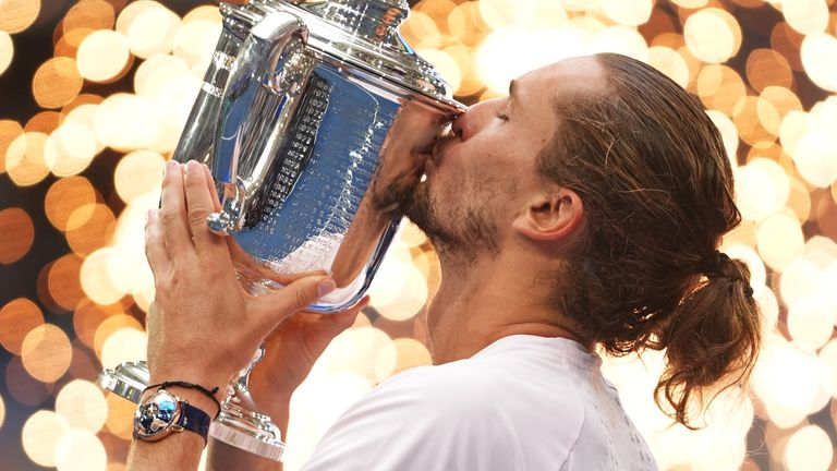 Alexander Zverev kisses the trophy after winning the US Open
