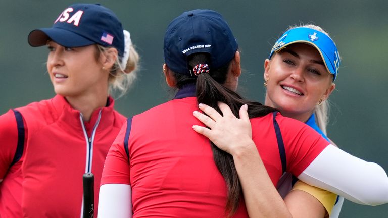 Europe's Charley Hull, right, United States' Allisen Corpuz and Nelly Korda, left, on their win at the 16th hole during a Solheim Cup 
