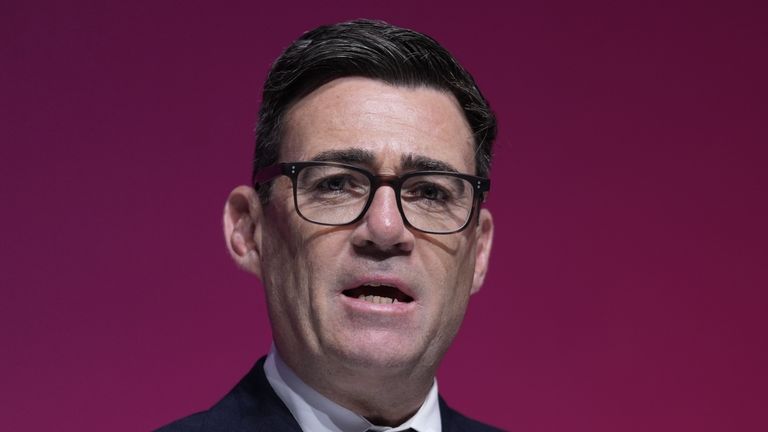 Prime Minister Andy Burnham on stage for the traditional singing of the Red Flag, at the end of the Labour Party Conference