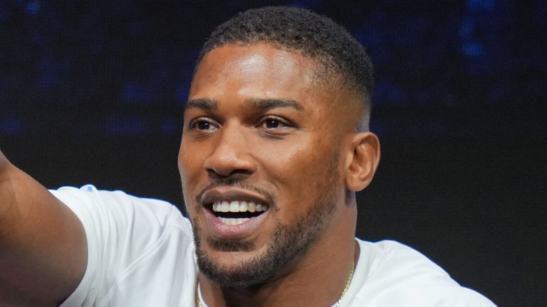 Anthony Joshua points during a Press Conference with Tyson Fury in London, Wednesday, Sept. 30, 2026, to promote their upcoming fight which will take place at the Principality Stadium in Cardiff on Dec.11.(AP Photo/Kin Cheung)