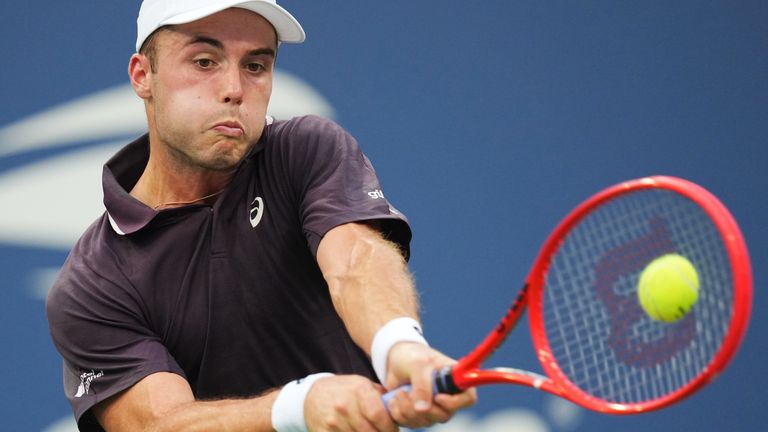 Arthur Fery, of Britain, returns the ball to Lorenzo Musetti, of Italy, during the first round of the U.S. Open tennis championships Tuesday, Sept. 1, 2026, in New York. (AP Photo/Kirsty Wigglesworth)