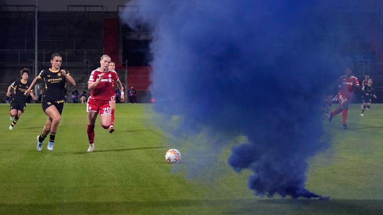 A flare was on the pitch during Man City's first goal