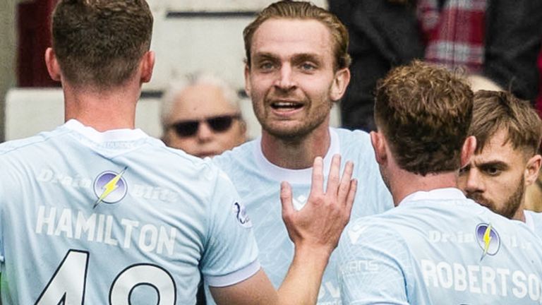 Dundee's Bradley Fink celebrates after scoring to make it 1-0