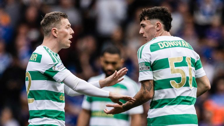 Captain Callum McGregor (L) tried to calm the players after conceding a third at Ibrox
