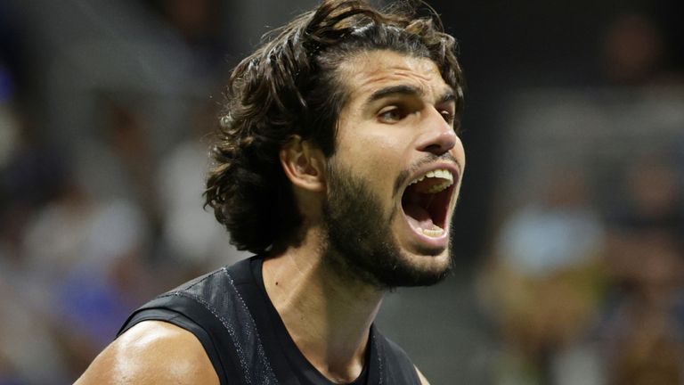 Carlos Alcaraz, of Spain, celebrates after a point in the fifth set against Ben Shelton, of the United States, during the quarterfinal 