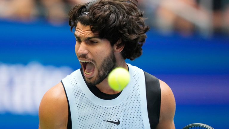 Carlos Alcaraz, of Spain, reacts during the fourth round of the U.S. Open tennis championships against Tommy Paul, of the United States, Sunday, Sept. 6, 2026, in New York. (AP Photo/Yuki Iwamura)