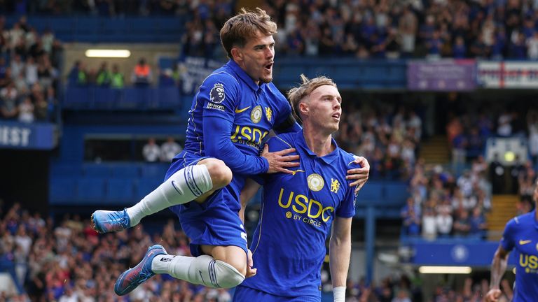 Chelsea's Cole Palmer, centre, celebrates with teammates after scoring against Brighton