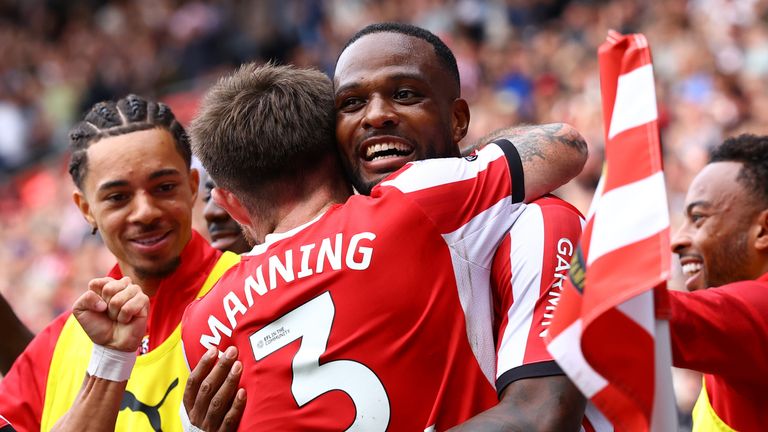 Southampton's Cyle Larin is congratulated by his team-mates after opening the scoring