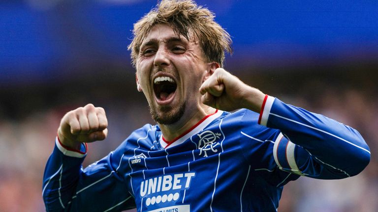 Dan Neil netted a double against Celtic as Rangers reached the League Cup semi finals 