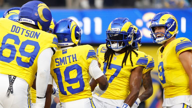 Los Angeles Rams wide receiver Davante Adams (17) celebrates his touchdown catch with teammates against the New York Giants