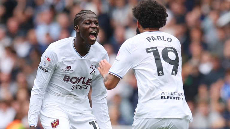 Mohamadou Kante celebrates with Pablo after scoring for West Ham at Millwall