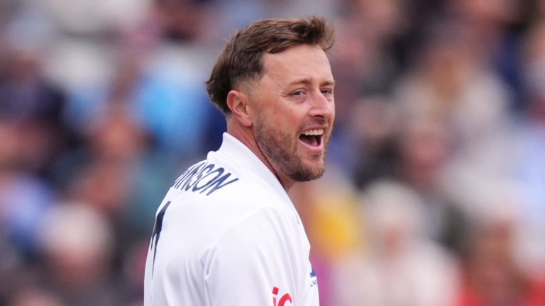 England's Ollie Robinson celebrates the wicket of Pakistan's Saim Ayub