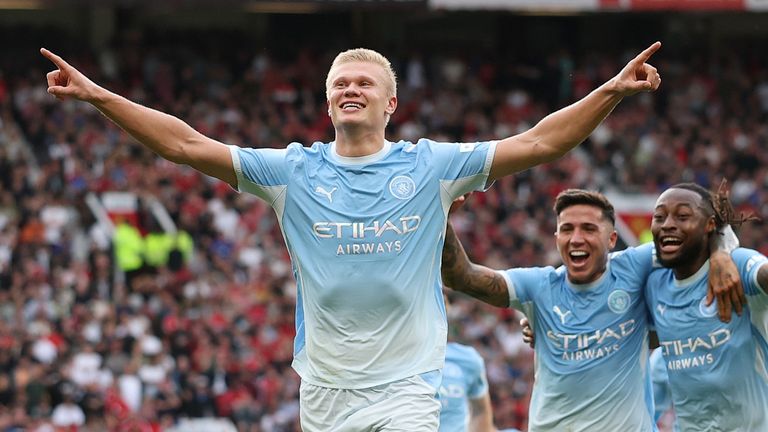 Erling Haaland celebrates after his goal is given following a lengthy VAR review