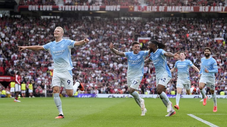 Erling Haaland and his Man City team-mates celebrate after going 1-0 up at Old Trafford
