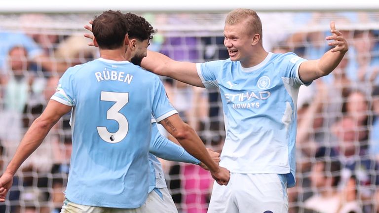 Erling Haaland celebrates with his team-mates after scoring Man City's fifth goal against Sunderland