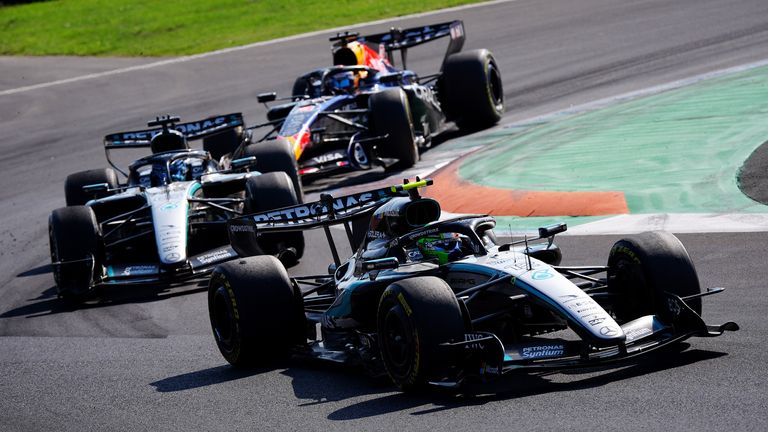 Kimi Antonelli, George Russell and Max Verstappen (PA)