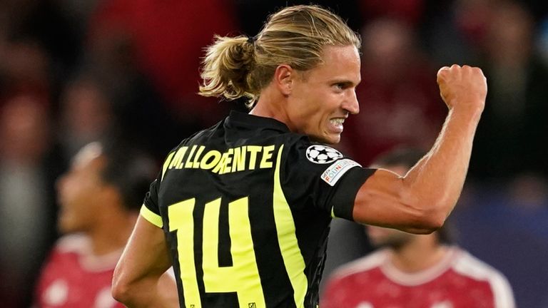 Atletico Madrid's Marcos Llorente celebrates after scoring the opening goal against Liverpool