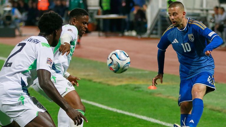 Kosovo's Edon Zhegrova lobs the ball over Ireland's James Abankwah