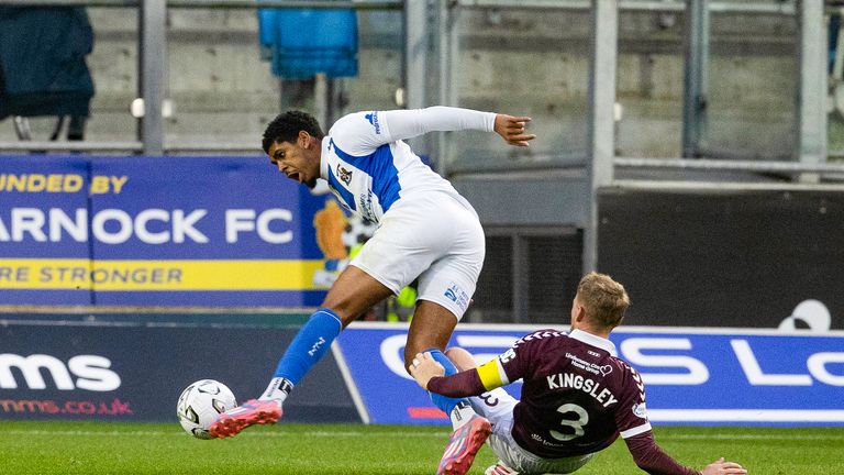 Kilmarnock's Tyreece John-Jules (L) and Hearts' Kingsley in action 
