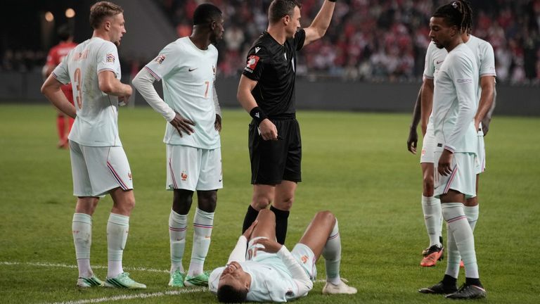 France's Kylian Mbappe lieas on the ground after he scored and injured himself during the UEFA Nations League soccer match between Turkey and France in Izmit, Turkey, Friday, Sept. 25, 2026. (AP Photo/Khalil Hamra)