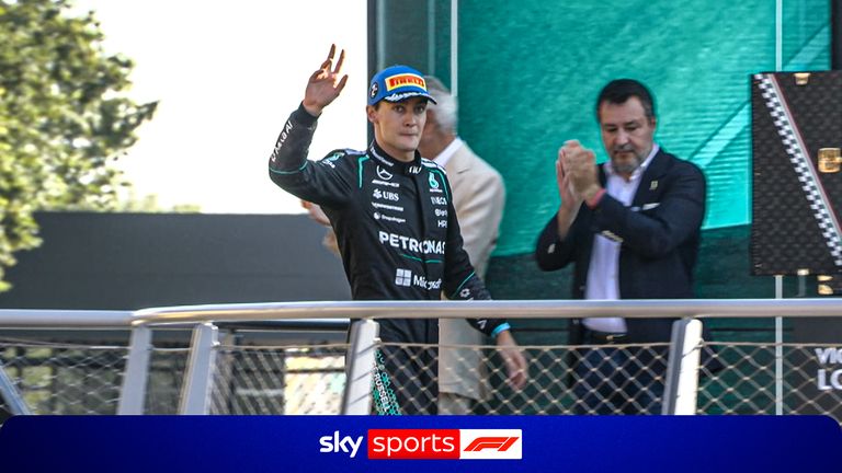 The crowd erupted with boos aimed at George Russell as he stepped on Monza podium.