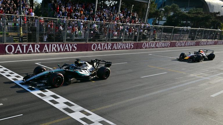 Mercedes driver George Russell of Britain crosses the finish line during the Azerbaijan F1 Grand Prix auto race, in Baku, Azerbaijan, Saturday, Sept. 26, 2026. (Andrej Isakovic/Pool..via AP)