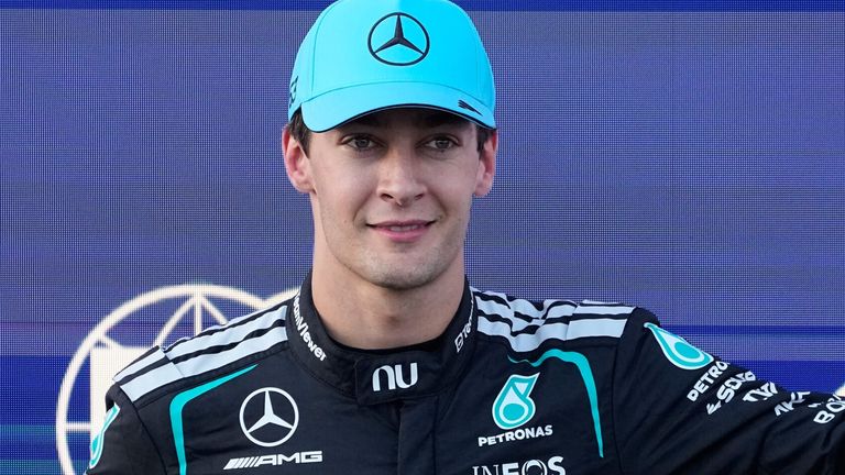 Mercedes driver George Russell of Britain celebrates after he clocked the fastest time during the qualifying session for the Azerbaijan F1 Grand Prix, in Baku, Azerbaijan, Friday, Sept. 25, 2026. (AP Photo/Darko Bandic)