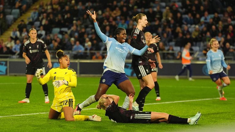 Liverpool's Grace Fisk scores an own goal to give Man City a late lead in WSL encounter