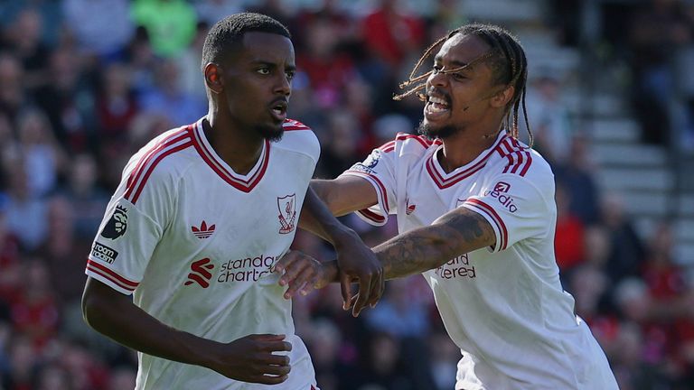 Liverpool's Alexander Isak, left, celebrates with Liverpool's Bradley Barcola 