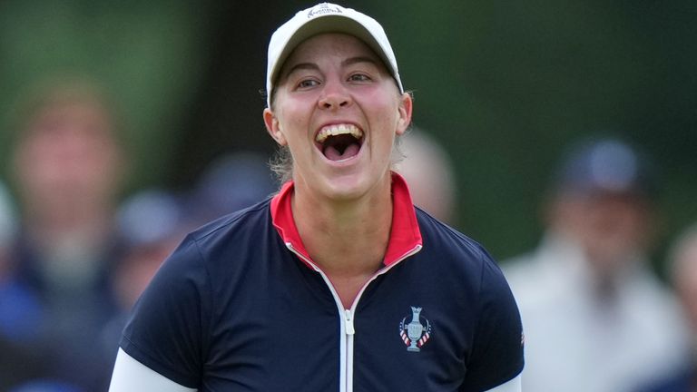 Jennifer Kupcho of the United States celebrates after holing a putt on the 17th green during the Solheim Cup (AP Photo/Alastair Grant)