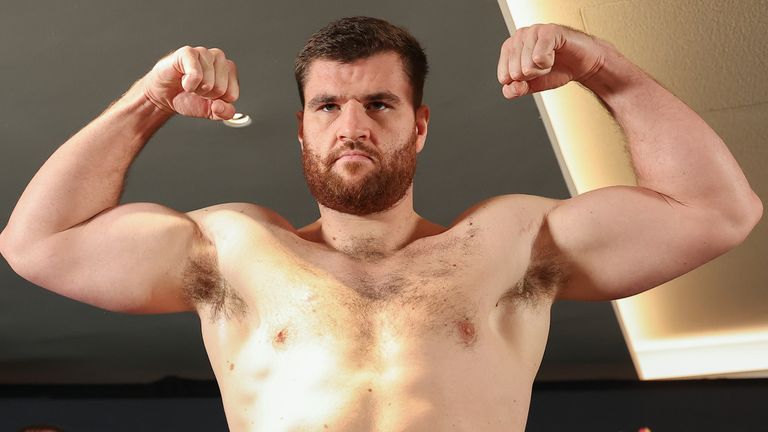 LONDON, ENGLAND - SEPTEMBER 25: Johnny Fisher poses on the scale for the Zuffa Boxing 11 official weigh-in at The Stratford on September 25, 2026 in London, England.  (Photo by Ed Mulholland/Zuffa Boxing/Zuffa Boxing via Getty Images)