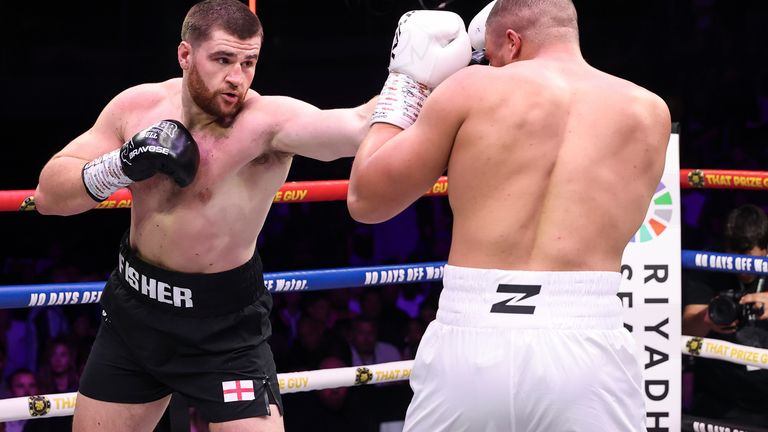 Johnny Fisher tries to break through Michael Pirotton's guard