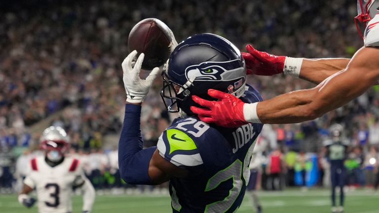 Seattle Seahawks cornerback Josh Jobe intercepts Drake Maye's pass in the end zone to ice the game 