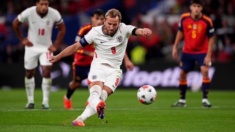England's Harry Kane slips and fires his penalty against the bar in the match with Spain